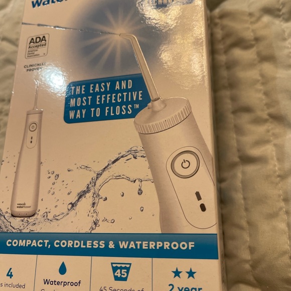 Waterpik WF-11W010-1 ION Water Flosser (White) NEW - Picture 1 of 4